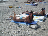 Nice girls topless at beach