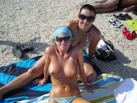 Nice girls topless at beach