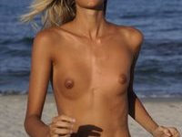 Beautiful young small tits GF naked on beach
