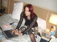 Redhair girl in stockings and very sexy clothing