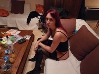 Redhair girl in stockings and very sexy clothing