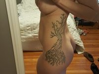 Tattooed teen GF with amazing ass