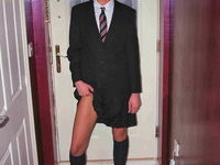 MILF masturbates while dressed in a school uniform