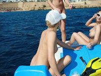 Very sweet young girls naked on boat