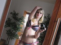 Isabella making nude selfies at mirror