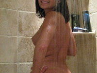 Brunette GF Caroline naked at shower