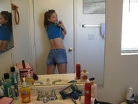 Young amateur GF selfies at mirror