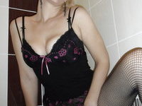 Blond amateur MILF showing her tits
