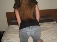 Amateur GF with long hair posing at home