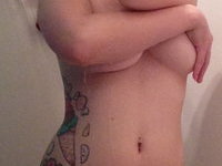 Sexy tattooed teen with floppy tits