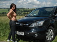 German GF posing naked near car