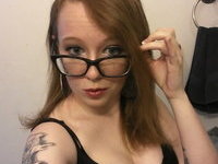 Young amateur GF with tattoos and glasses