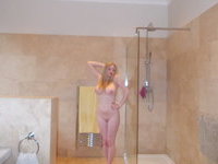 Beautiful busty blonde girl posing nude