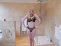 Beautiful busty blonde girl posing nude