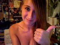 Pretty teen girl posing on webcam