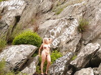 Sexy MILF nude posing in nature