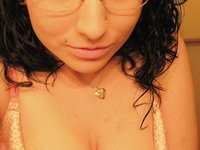 Busty amateur girl in glasses