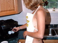 Hot MILF naked at kitchen
