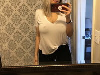 Blonde amateur girl showing her VERY big tits