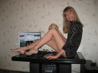 Blonde amateur girl posing in her room
