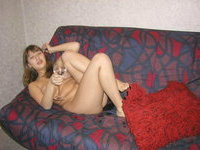 Young amateur GF naked on sofa