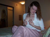 Lisa masturbating on bed