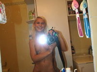 Cute amateur blonde GF nude posing pics