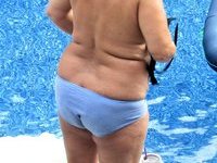 Mature Wife Stripping at the Pool