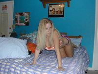 Brunette amateur GF posing on bed
