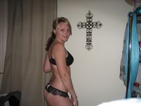 Young amateur blonde babe teasing in her room