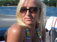 Sexy blond MILF at boat and at home
