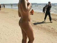 Beach babe sunbathing naked