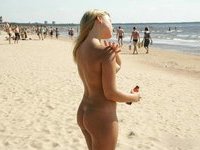 Beach babe sunbathing naked