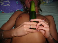 Blond slut with cucumber