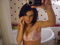 Sexy brunette Cassie making selfies