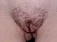 Real amateur MILF shows hairy cunt