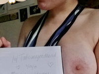 Busty amateur girl showing her tits