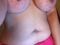 Curvy huge tit BBW with pierced nipples