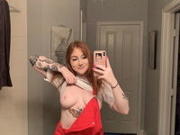 Sexy tattooed redhead GF