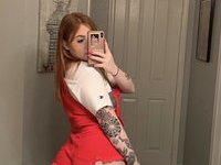 Sexy tattooed redhead GF