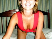 Amateur MILF stripping on bed