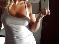 Sexy young amateur blonde GF shows her big tits