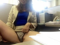 Horny office slut showing her tits