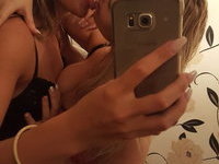 Sexy teen babe teasing and lesbian kissing with friend