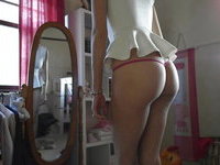 Teen girl shows off her pink panties