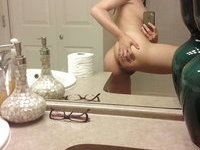 Naughty brunette wife takes self pics