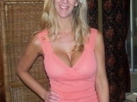 Tall and sexy MILF shows off her big tits