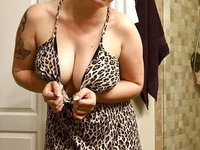Curvy tattooed MILF with big ass and great tits