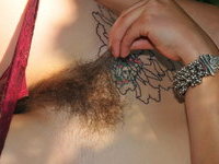Filthy hairy hippie teen slut shows hairy holes