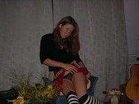 Blond wife poses, spread her legs and plays